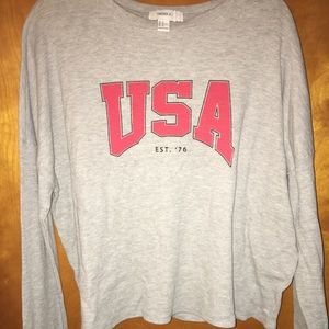 Plus size long sleeved crop top.